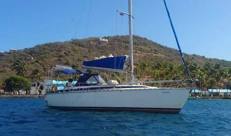 'Anna', a Bavaria 390 sailboat at anchor