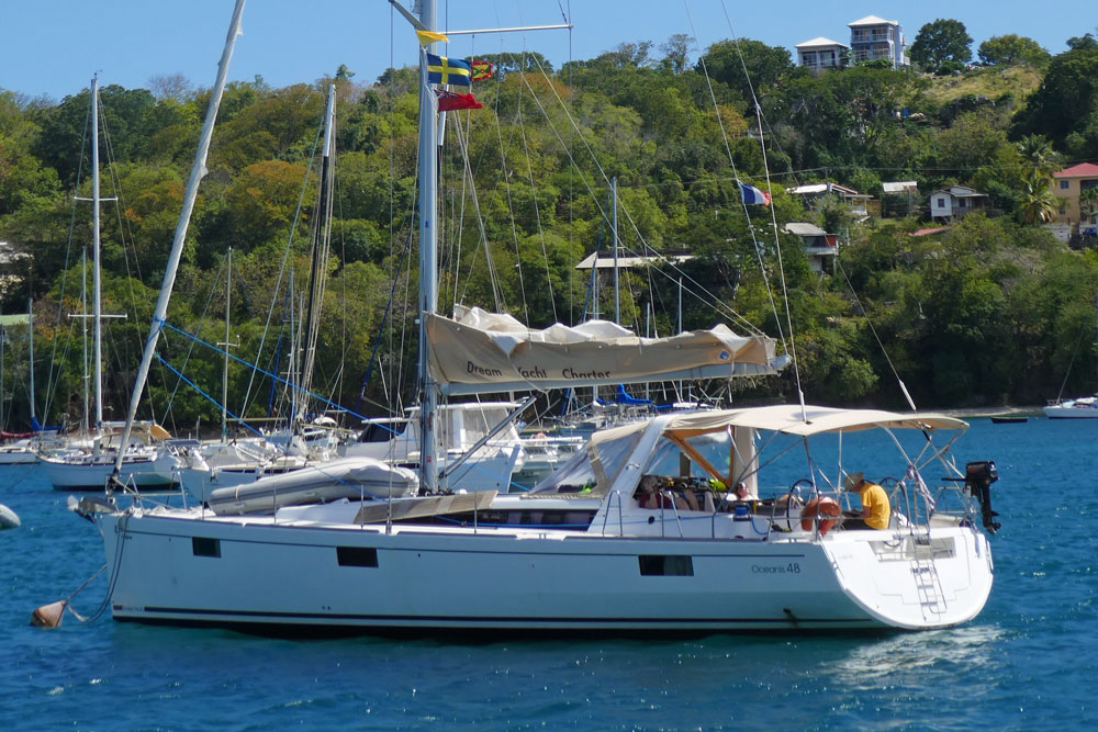 A Beneteau Oceanis 48 on a mooring ball