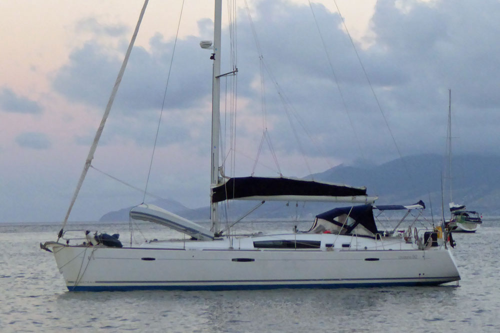 A Beneteau Oceanis 50 sailboat at anchor