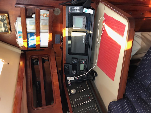 Navigation station on C&C 34+ sailboat at foot of companionway