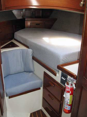 Forepeak berth in a Crealock 37 sailboat