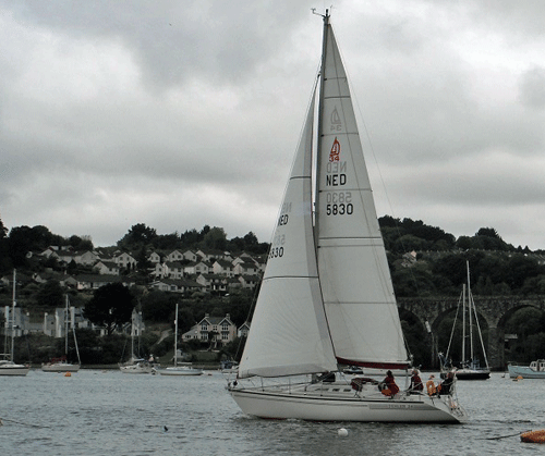 'Smile', a Dehler 34 sailboat sailing on the River Tamar, UK