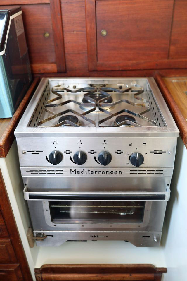 A 3-burner stove on a Downeaster 38 sailboat