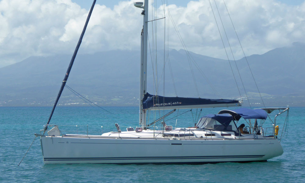 A Dufour 455 at anchor