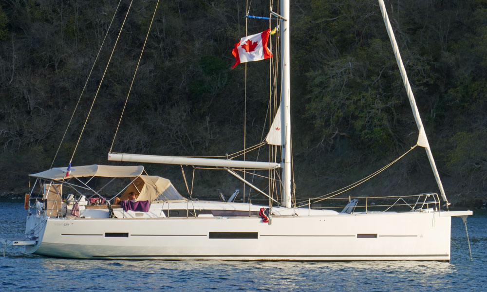 A Dufour 520 Grand Large sailboat at anchor in Chatham Bay, Union Island, West Indies