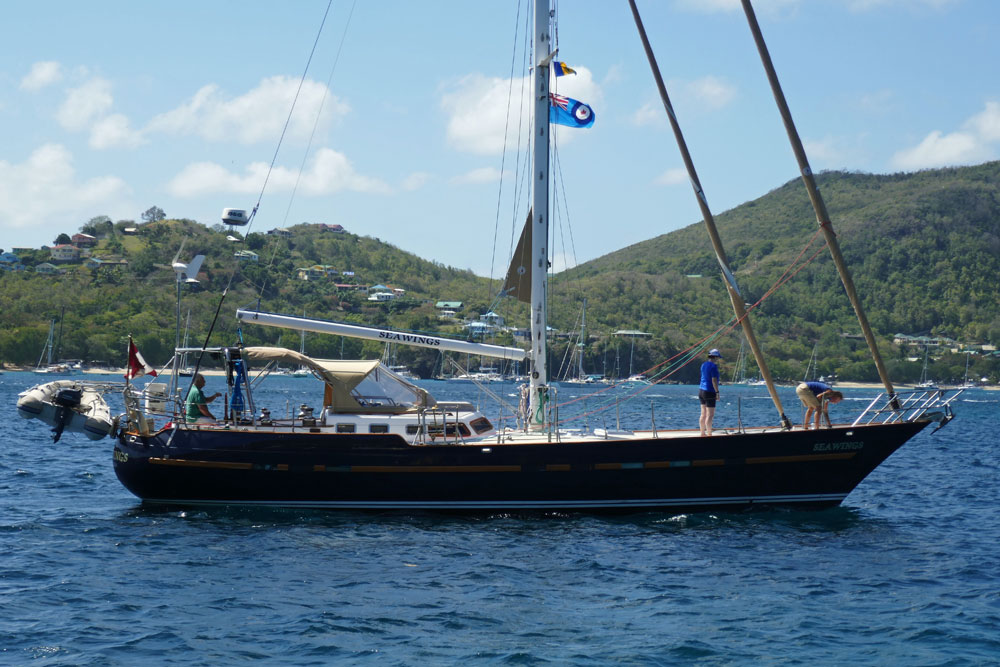 'Sea Wings', a Flying Dutchman 12, leaving Bequia in St Vincent & the Grenadines