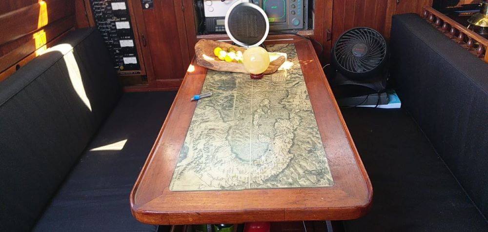 Custom upholstery and old map table top on this Hardin Seawolf sailboat