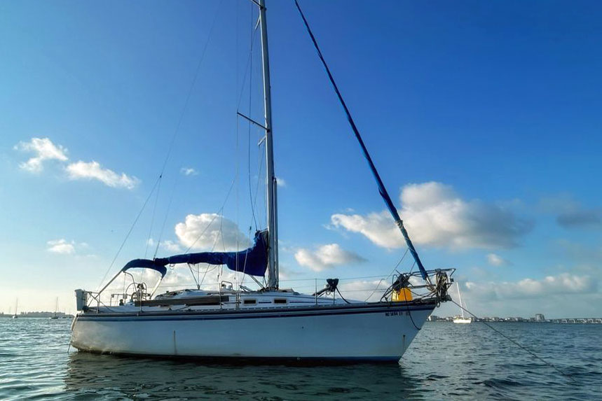 A Hunter 31  sailboat at anchor