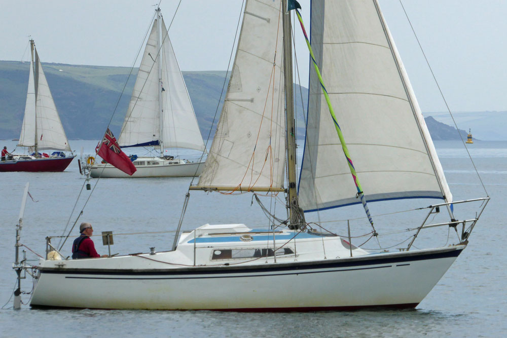 A Hurley 24 sailboat sailing in Plymouth Sound, UK