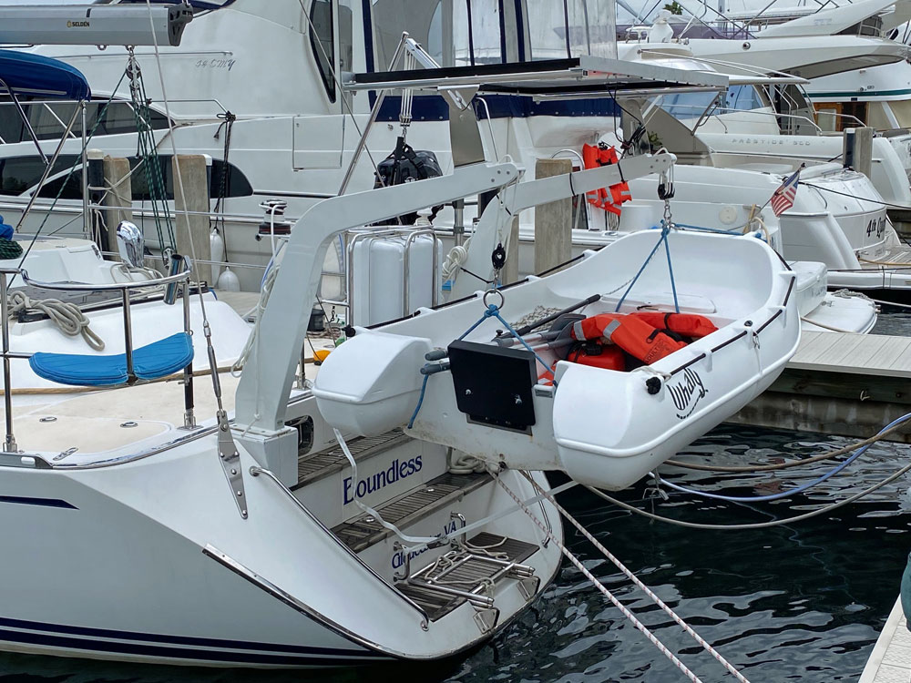 Dinghy in davits on 'Boundless', a Hylas 46 sailboat