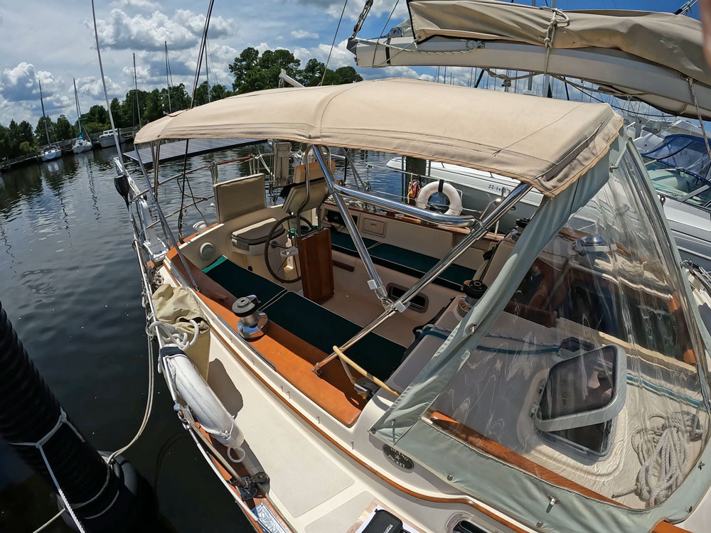 The cockpit of an IP 38 sailboat