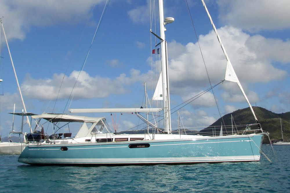 A Jeanneau Sun Odyssey 47 sailboat at anchor in Grande Anse D'Arlet, Martinique, French West Indies