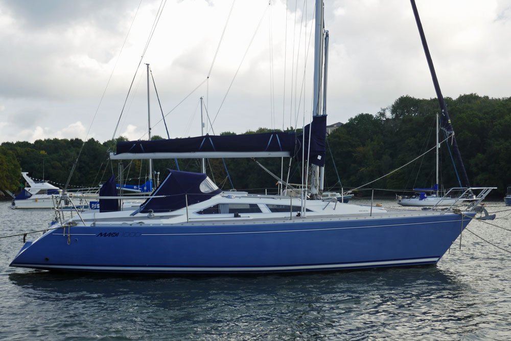 A Maxi 1000 sailboat on a Tamar River Sailing Club mooring, based in Devon, England