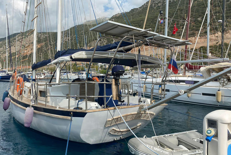 A Hout Bay 40 sailboat moored stern-to a dock