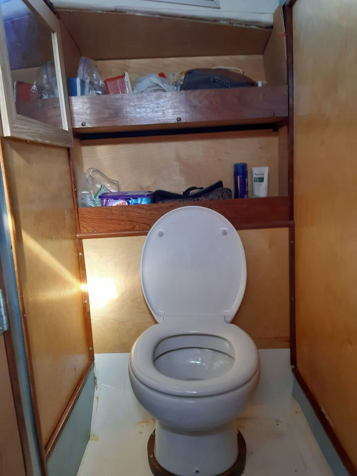 The toilet compartment on a Moody 33 sailboat