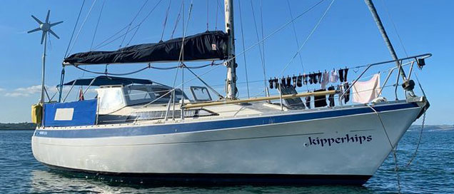 A Moody 33s sailboat at anchor