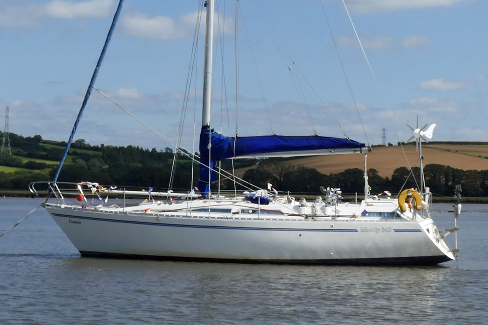 A Moody 346 sailboat moored on the River Tamar in the UK