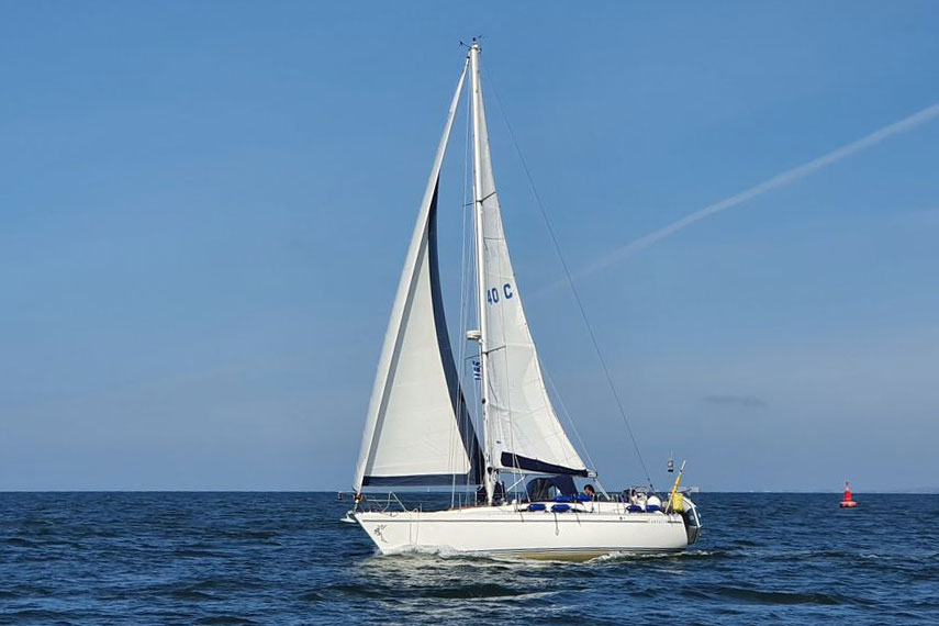 A Moody 37 sailboat under sail