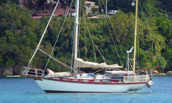 A staysail ketch about to drop her anchor off St Georges, Grenada, West Indies
