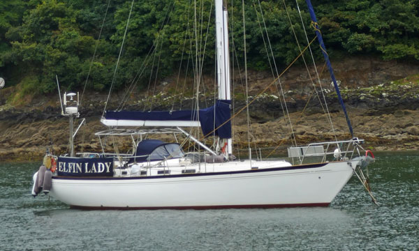 A Nicholson 476 on a mooring ball in Cornwall's Helford River in the west of England