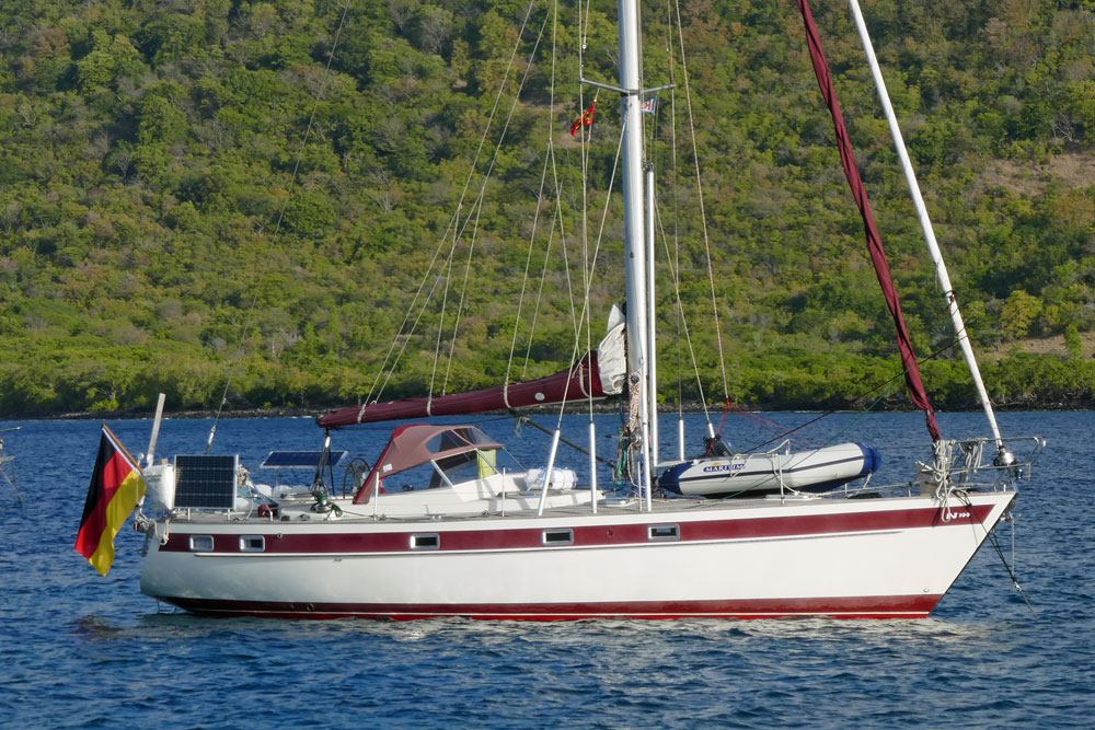 A Najad 390 sailboat at anchor