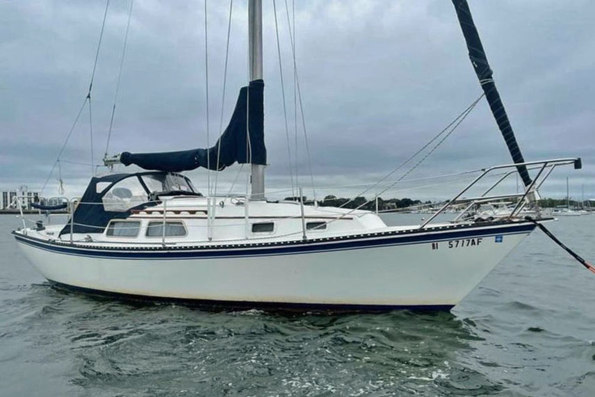 A Newport 28 sailboat at anchor