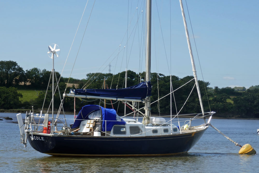 A Nicholson 32 sailboat moored on the River Tamar near Plymouth, UK