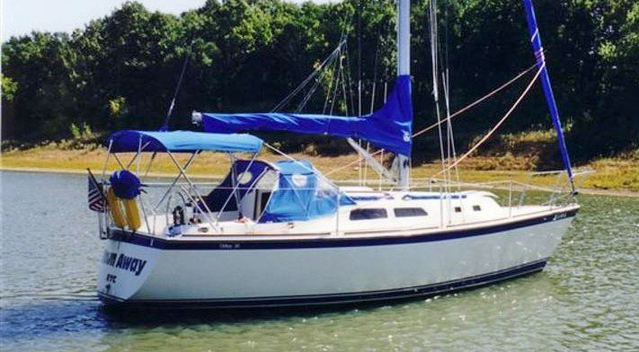 An O'Day 30 sailboat at anchor