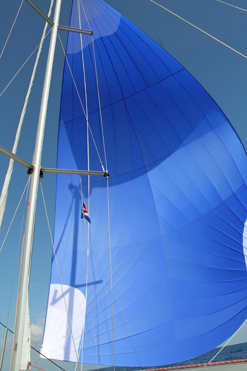 An asymmetric spinnaker, aka a cruising chute, on a Oceanis Clipper 393