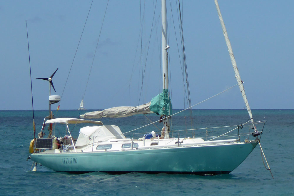 The Ohlson 38 'Azzurro' at anchor off St Anne, Martinique in the French West Indies