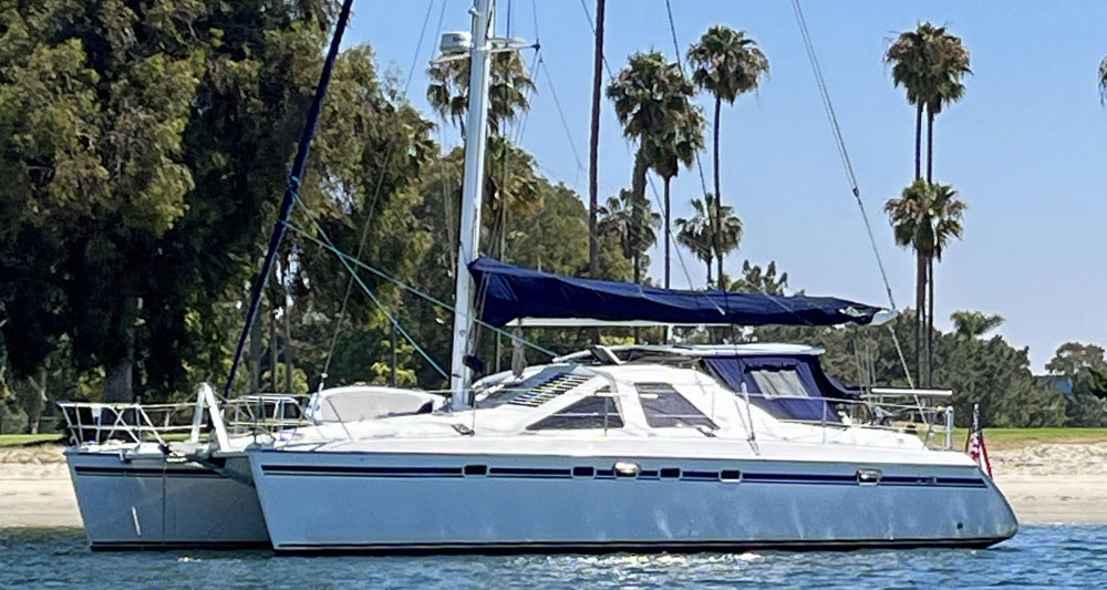 A Privilege 42 catamaran anchored close to shore