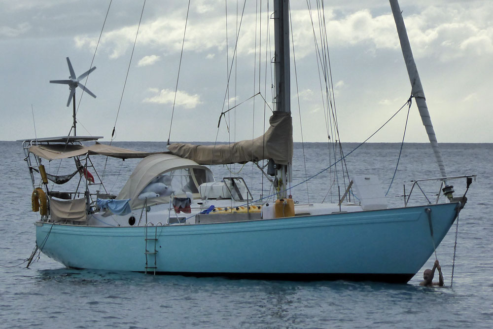 The Rival 38 sailboat 'Wandering Dream' at anchor off Deshaies in Guadeloupe, French West Indies