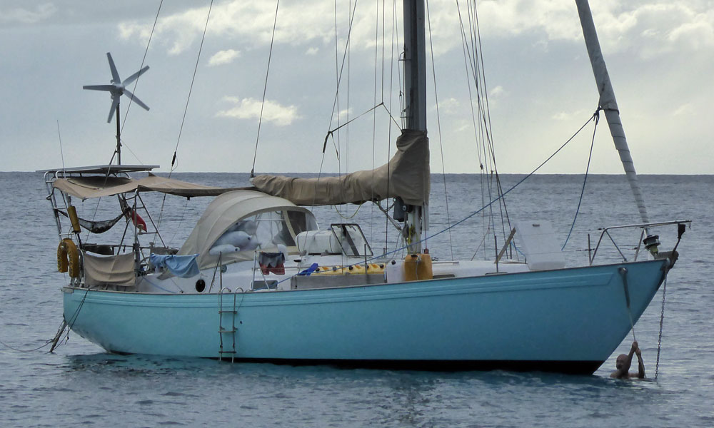 The Rival 38 sailboat 'Wandering Dream' at anchor off Deshaies in Guadeloupe, French West Indies