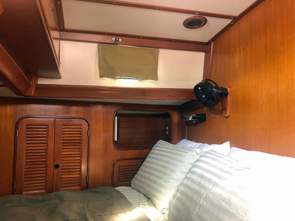 The portside double berth on a Mason 43 sailboat