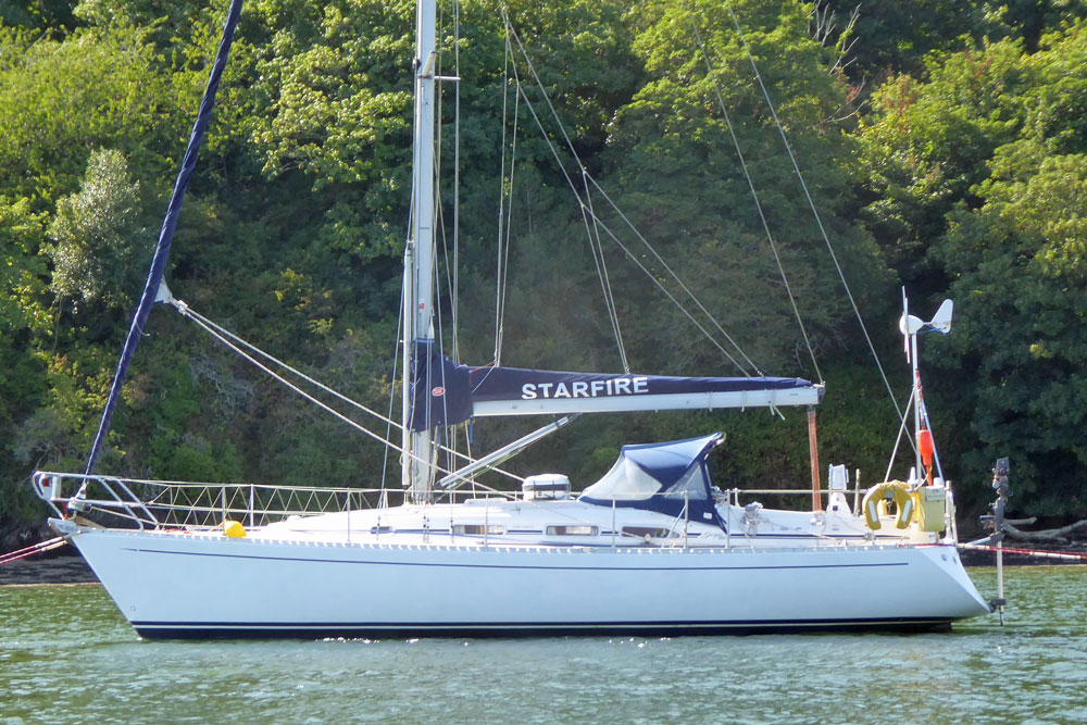 A Starlight 35 sailboat moored on the River Tamar in the UK