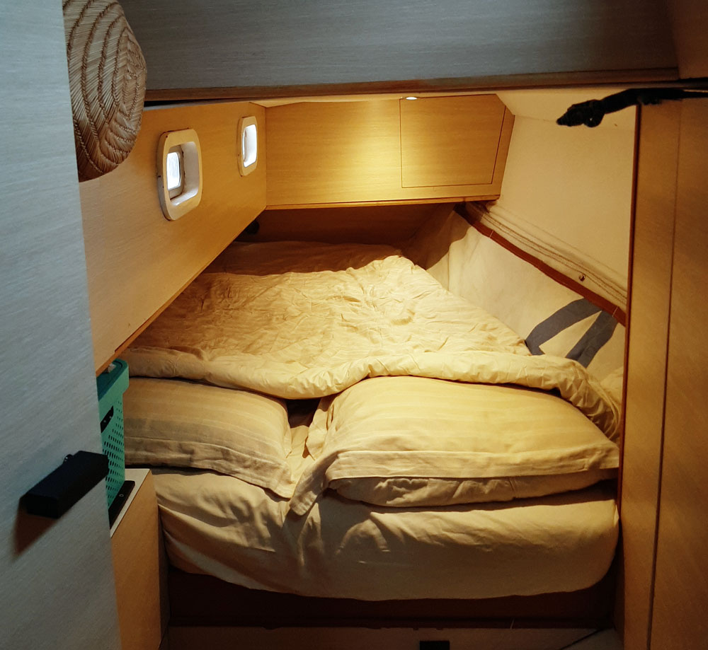 The double berth in the stern of a Van de Stadt Caribbean 40 sailboat