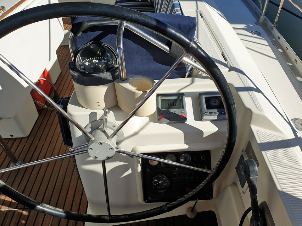 Wheel steering on a Jeanneau Sun Odyssey 45-1 sailboat