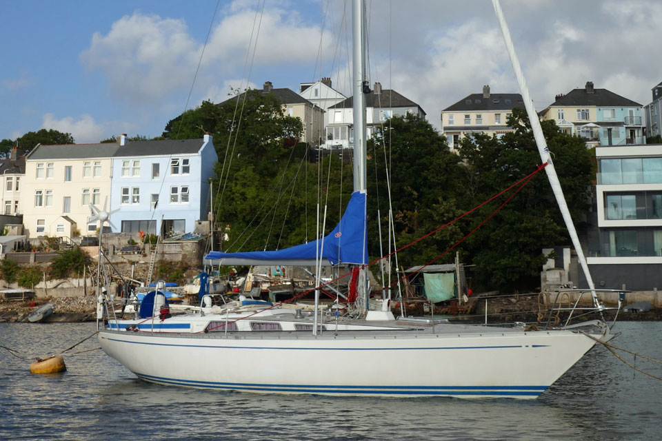 A Swan 38 sailboat on a Tamar River Sailing Club mooring in Devon, England.