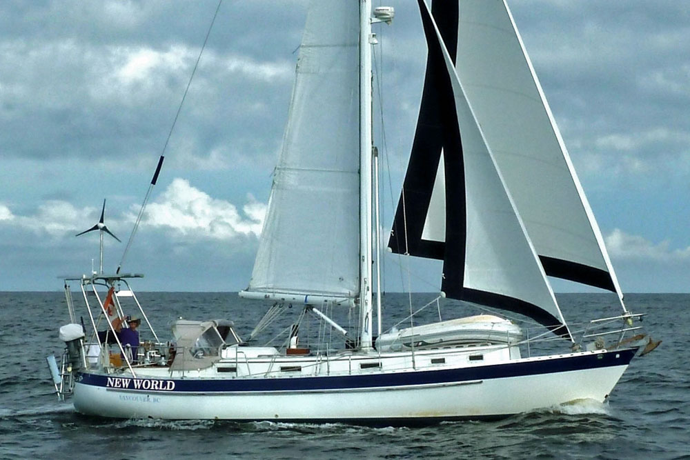 'New World', a Valiant 40 Bluewater Cruising Yacht reaching under full sail.