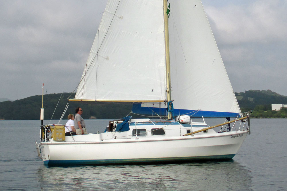A Westerly Centaur 26 sailing in light airs on the River Tamar in the UK