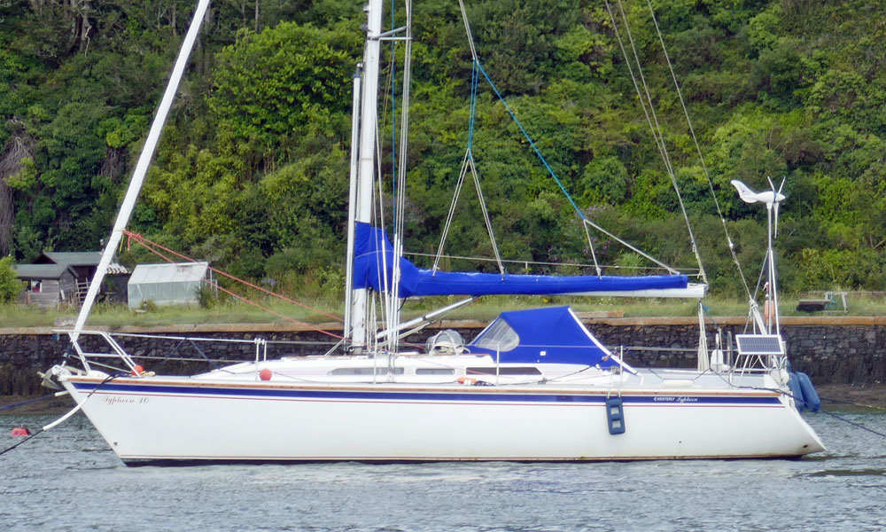 A Westerly Typhoon 37 sailboat on a river mooring