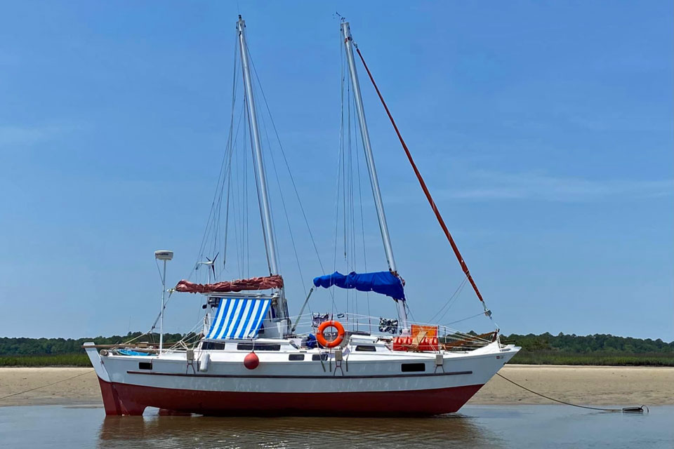 A Wharram Tiki 38 Catamaran dried out on a sandbar