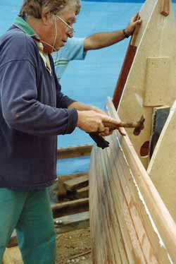 Planking up a hull using the wood epoxy technique and western red cedar strip planks