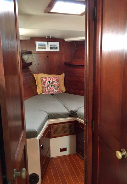 The V-berth in the forepeak of a Morgan 41 Classic sailboat