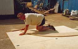 Marking out the temporary frames for a cedar strip, wood epoxy boat building project