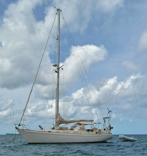 A centre-cockpit version of the Rival 42 cruising boat at anchor