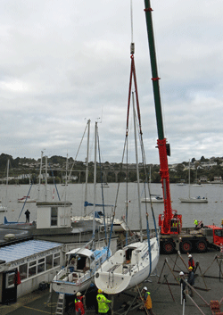 Hauling out your boat and laying her up safely ashore at the end of the the sailing season is not something to take lightly. Here's how to do it right.