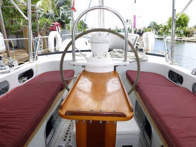 A cockpit table in a tiller steered yacht