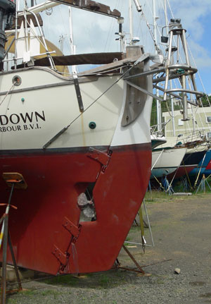 An Outboard Rudder on a heavy displacement, long-keeled, canoe-sterned sailboat.