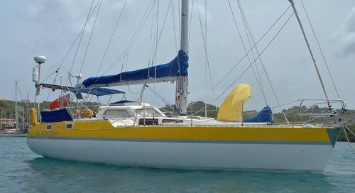 Our self-build wood-epoxy cutter "Alacazam" at anchor in Prickly Bay, Grenada, West Indies, having successfully completed her first trans-Atlantic passage.